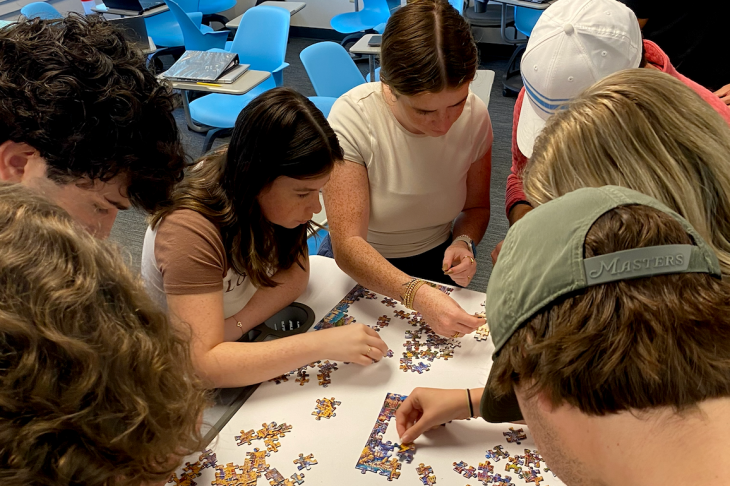 Elon University Students participating in puzzle exercise